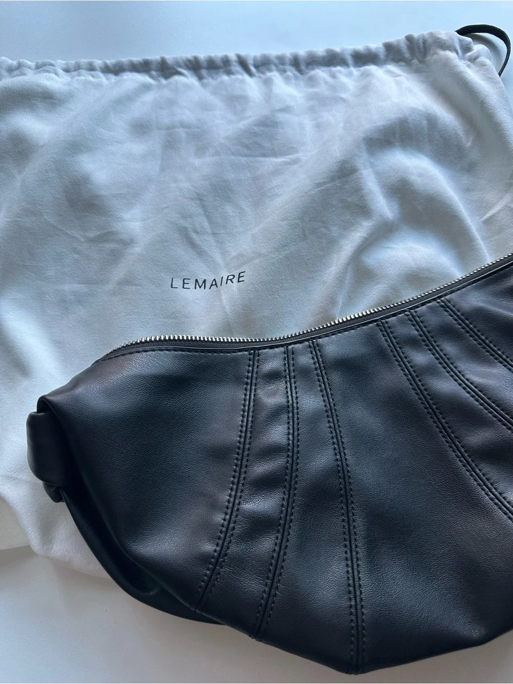 Black croissant bag